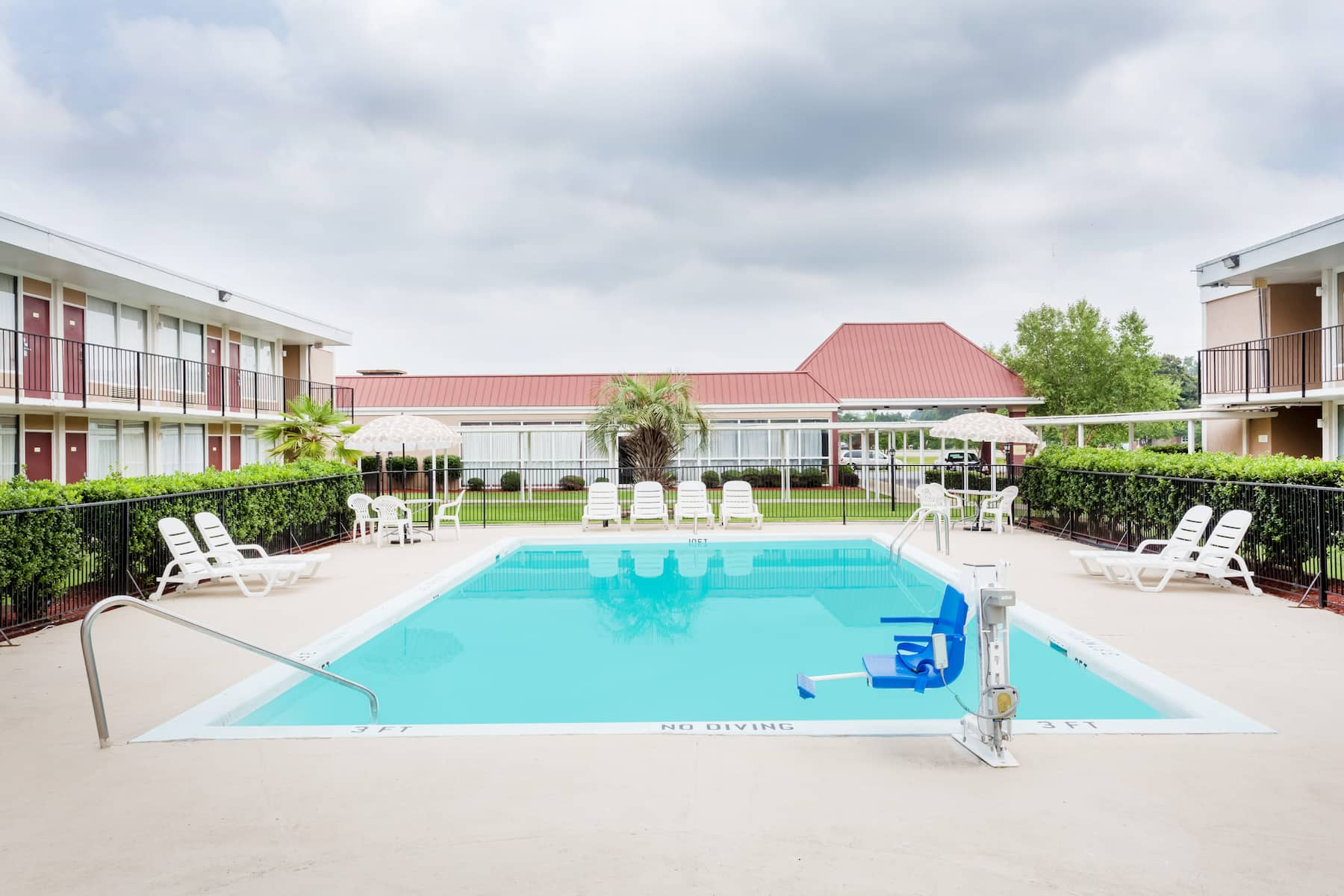 Outdoor pool at Days Inn Goldsboro, NC hotel